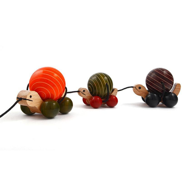 Hand-Crafted Wooden Pull Toy with Rotating Shells -Tuttu the Turtle and Family (Orange, Green and Brown)