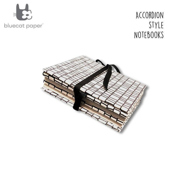 White Accordion Style Handmade Paper Journal with Black Lines (4 sets of 18 pages each)